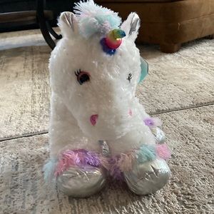 White, silver, pink, purple and blue Unicorn plushy